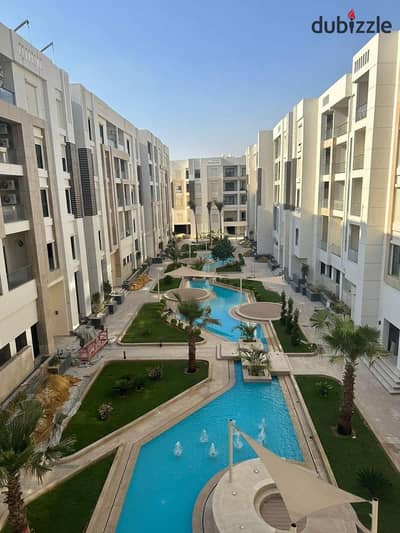 Apartment for sale, fully finished, with air conditioners and kitchen, in Heliopolis Sheraton, next to Wadi Degla Club, with a view of the swimming po