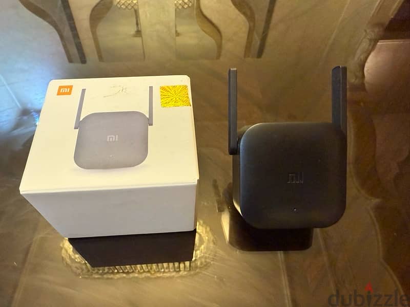 Xiaomi Mi Wi-Fi Range Extender Pro  استخدام شهرين بالضمان 1