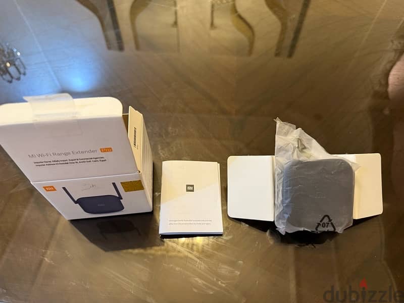 Xiaomi Mi Wi-Fi Range Extender Pro  استخدام شهرين بالضمان 3