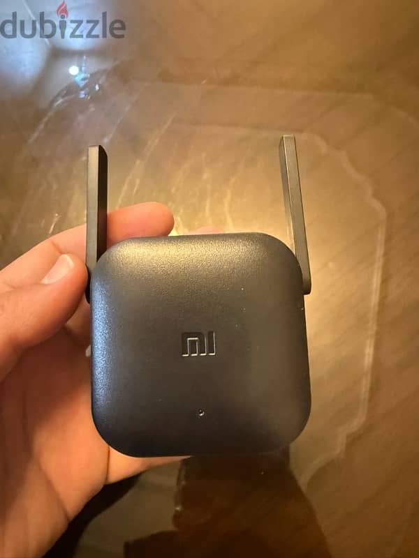 Xiaomi Mi Wi-Fi Range Extender Pro  استخدام شهرين بالضمان 5