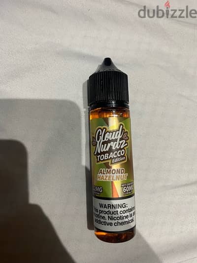 cloud nurdz mtl tobacco hazelnut almond 12mg nicليكويد توباكو بندق لوز