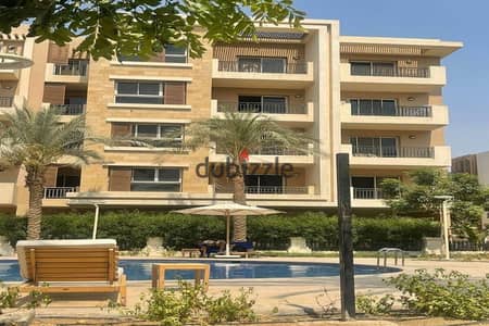 Apartment for sale with a large garden in Taj City Compound, New Cairo, at half price