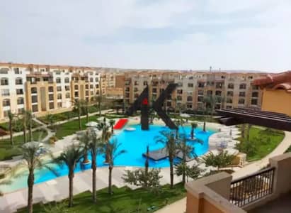 Swimming pool view Apartment For Sale in Stone Residence - New Cairo