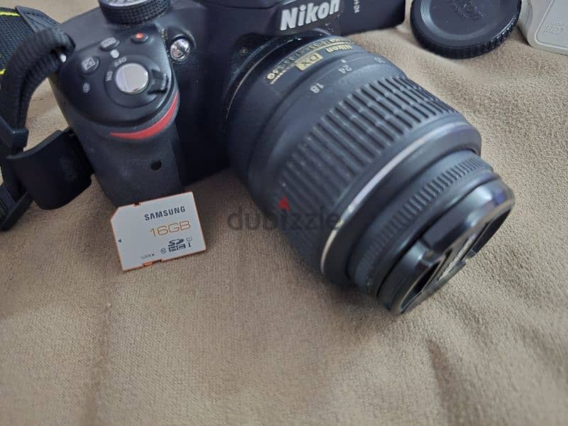 camera nikon d3200 with bag + lens + charger + memory card من السعوديه 1