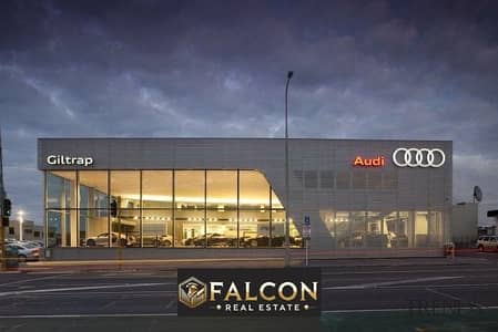 For sale, a first-row car showroom on the Suez Road, in the first Mega Mall, Al Shorouk 2 entrance, ready for inspection, in installments