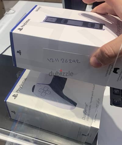 ps5 with extra charger , ps5 controller and 3 sealed games