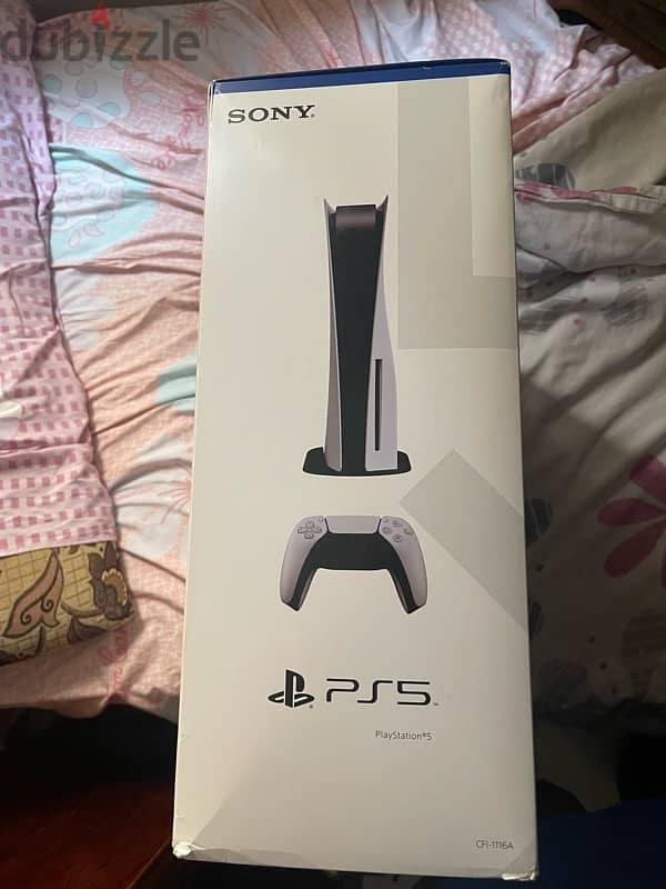 ps5 with extra charger , ps5 controller and 3 sealed games 3