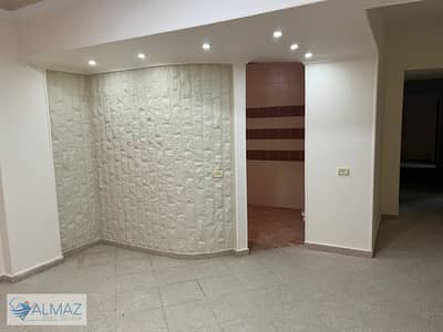 Empty apartment with kitchen for rent in Narges 1 villas in Fifth Settlement