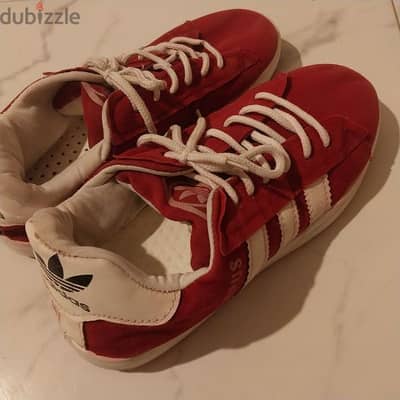 Woman red adidas shoes