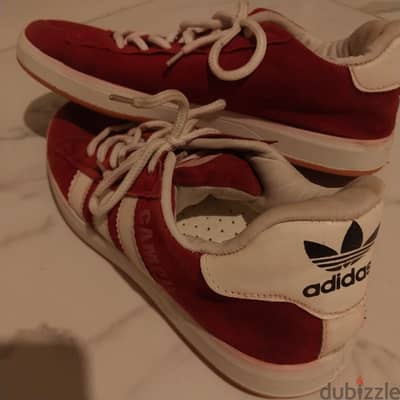 Woman red adidas shoes