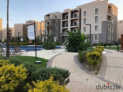 Apartment for Sale with a Prime View of the Clubhouse in October Plaza Compound - Sodic  Near Mountain View iCity, 10 Minutes from Sheikh Zayed.