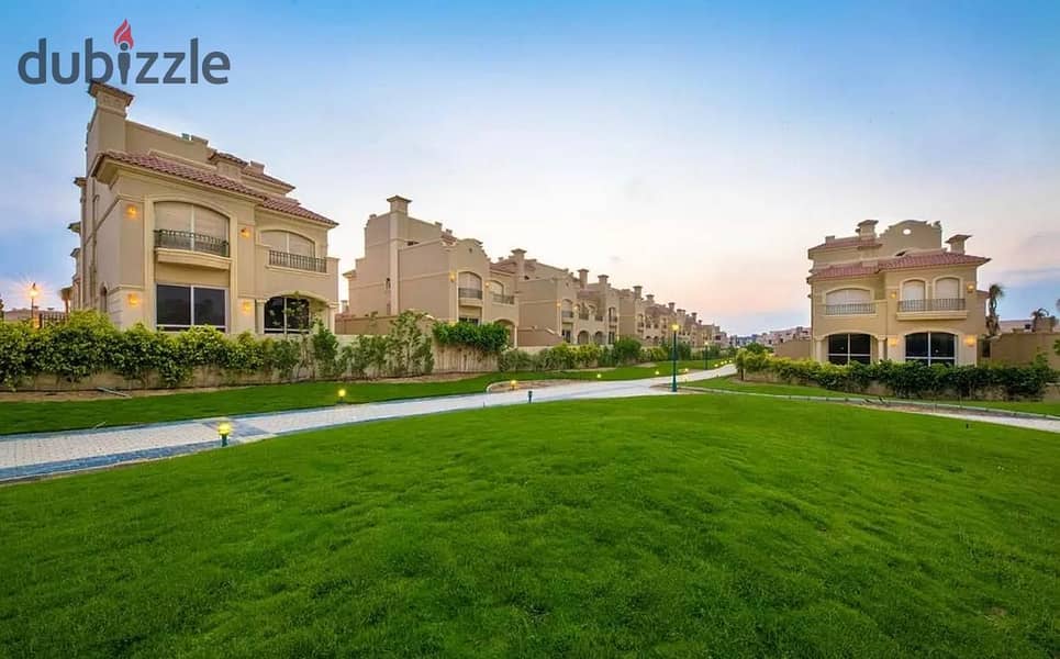 A 448 sqm villa with a garden, available on a 7-year installment in La Vista Sheikh Zayed, in Patio Vera, located on the Dahshour Link Road. 0