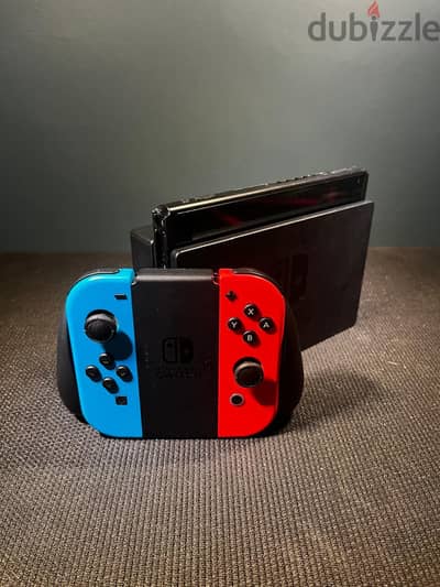 Nintendo Switch™ with Neon Blue and Neon Red Joy‑Con with accessoires