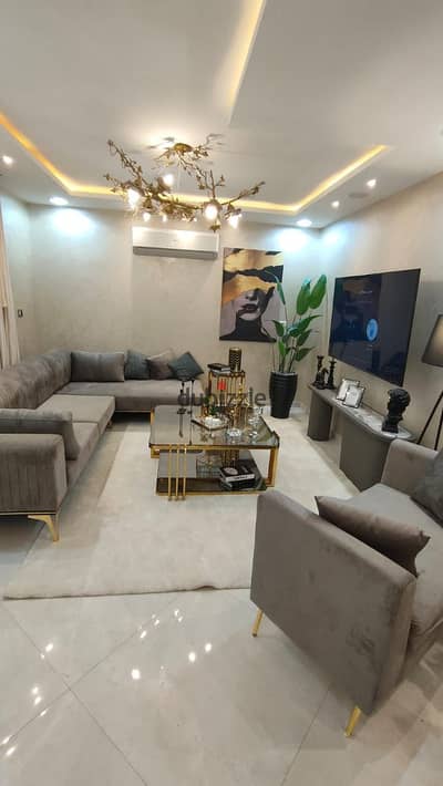 For sale and immediate receipt, a duplex with a garden, fully finished, with furniture and electrical appliances, in New Cairo, Fifth Settlement, at