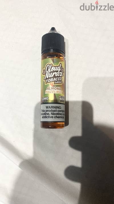 Liquid cloud nurdz mtl tobacco nuts 12mgليكويد توباكو بندق لوز + vct