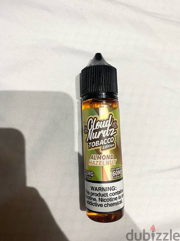 Liquid cloud nurdz mtl tobacco nuts 12mgليكويد توباكو بندق لوز + vct 5