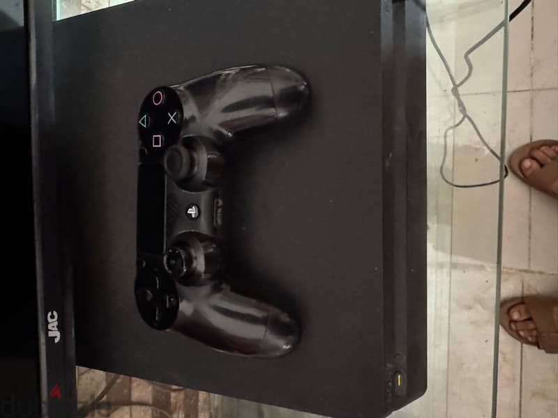 playstation 4 slim with 2 controllers and some games offline 1