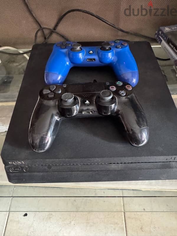 playstation 4 slim with 2 controllers and some games offline 2