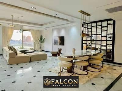 Receive now!! A fully finished apartment in the Hilton Hotel with VIP hotel services, a distinctive view of the Nile Corniche, Nile Pearl Towers