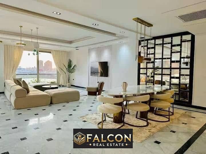 Receive now!! A fully finished apartment in the Hilton Hotel with VIP hotel services, a distinctive view of the Nile Corniche, Nile Pearl Towers 0