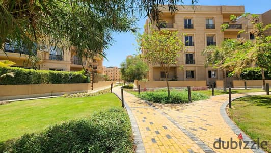 Own and move in immediately at a great price! An apartment with a garden in Sheikh Zayed, behind the Sporting Club, available for installment payments