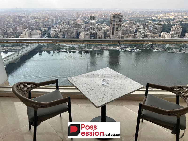 Fully finished and furnished hotel suite with fantastic view of the Nile with excellent hotel services in Maadi next to the Hilton Hotel Reve Du Nile 0