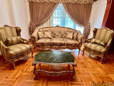 couch, two chairs and coffee table