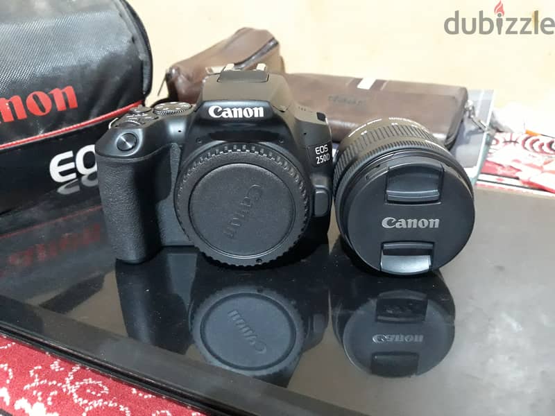 Canon EOS 250D EF-S 18-55mm f/3.5 شاتر ٥٠٠ 2