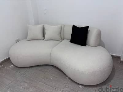 White rounded sofa