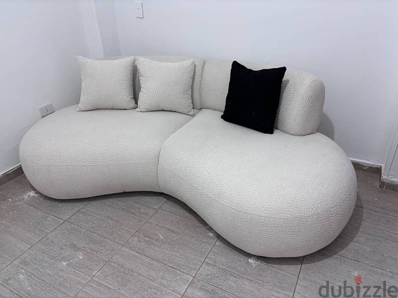 White rounded sofa 1