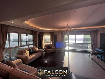 Royal suite with a stunning panoramic view first row on the Nile fully equipped with furniture and appliances in Reve du Nil Tower next to Hilton Maad