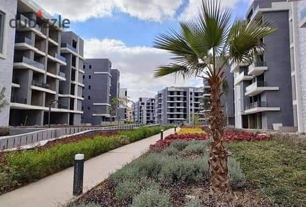 Apartment for sale, close receipt, with a landscaped view and fountains, in a distinctive location in front of the entrance to the new pyramids