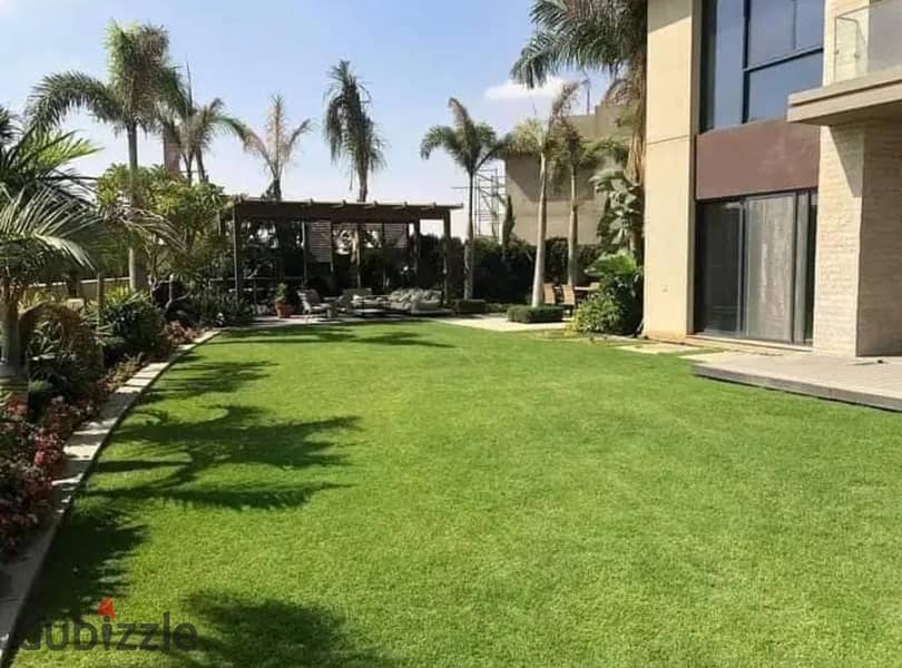 Immediate delivery with installment payments! A 300 m² garden duplex with a lagoon view, located in Sheikh Zayed at SODIC 0