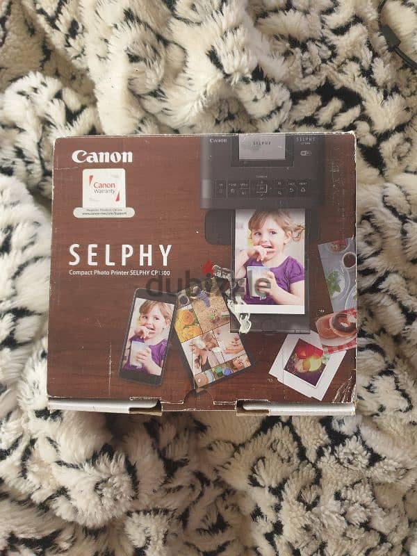 Canon selphy cp1300 compact photo printer camera/كاميرا كانون لطبع صور 1