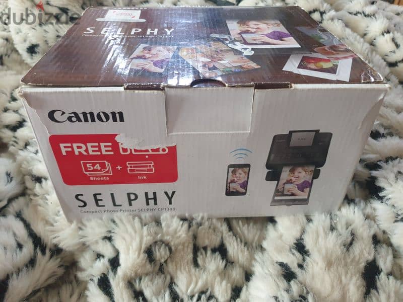 Canon selphy cp1300 compact photo printer camera/كاميرا كانون لطبع صور 2