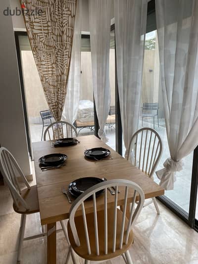 Apartment fully furnished With garden for rent at Compound Lake view, New Cairo Beside AUC