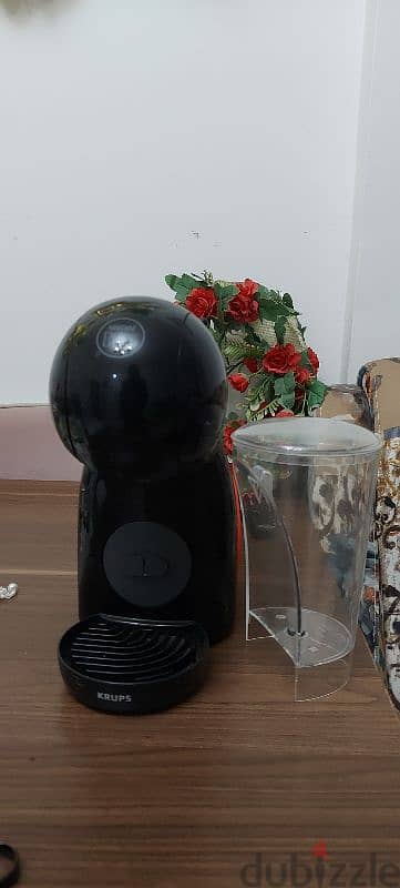 ماكينة قهوة اسمها (Nestle-Dolce Gusto) 2