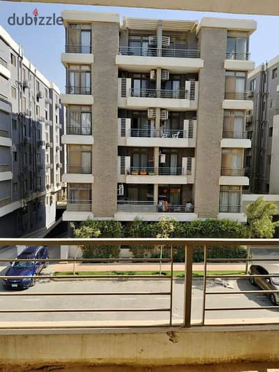 For sale, an apartment in Taj City Compound in New Cairo, in front of Gardenia, with a distinctive view