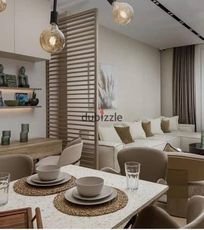 Duplex in a prime location, fully finished with air conditioning, available for sale in Sheikh Zayed 2o5 Towers with installment