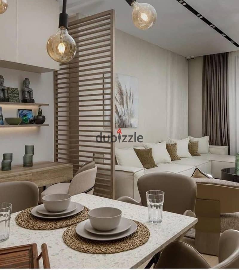 Duplex in a prime location, fully finished with air conditioning, available for sale in Sheikh Zayed 2o5 Towers with installment 0