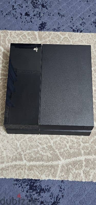 PS4 fat playstation used like new + 1 controller + 5 games free