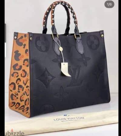 شنطه ميرور Louis vuitton