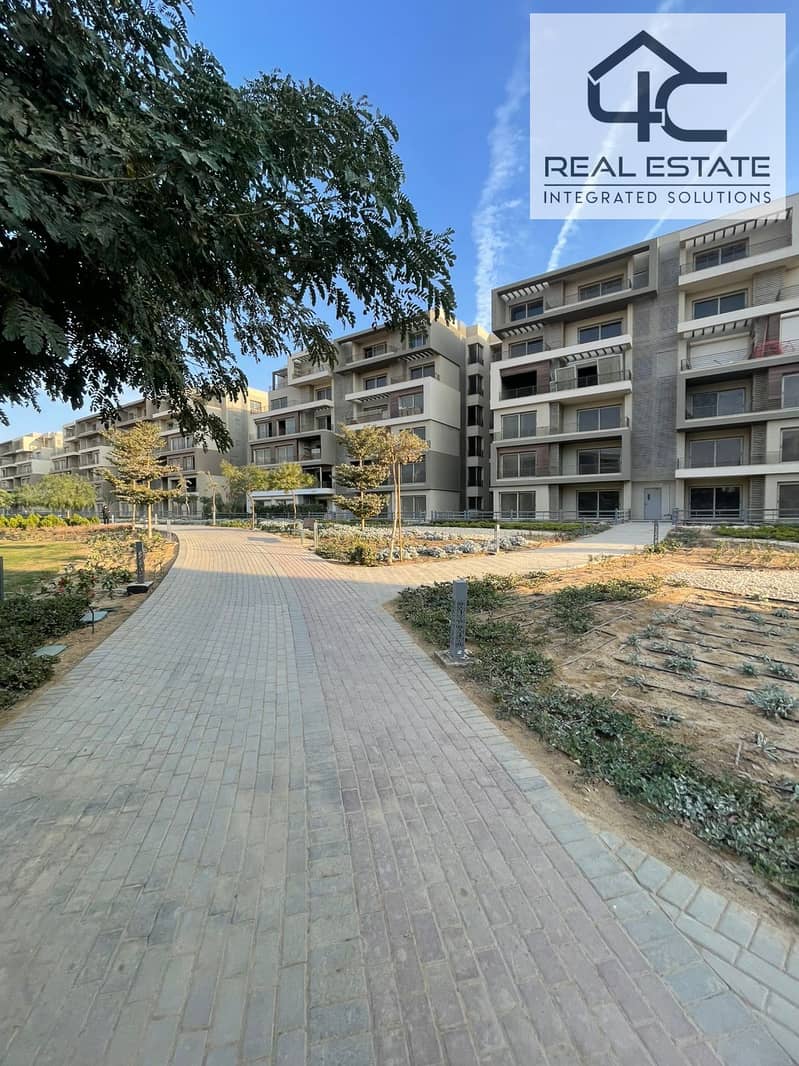 Ready to move apartment with garden corner 4 bedrooms master in prime location Landscape view for sale in Palm Hills New Cairo 0