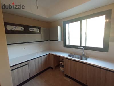 Apartment with private garden 4 bedrooms with AC's and kitchen . . prime location . . villette sodic behind mivida and lake view