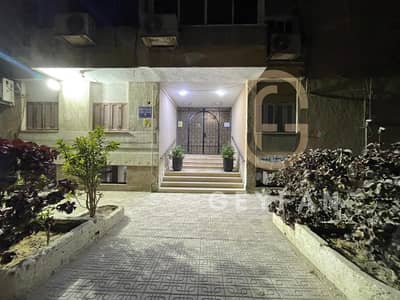 An apartment at the end of Mostafa El-Nahhas Street, near Shinzo Abe, behind Al-Masrawi Mosque.    - *Area:* 145 sqm (net)   - *Project:* 11-building