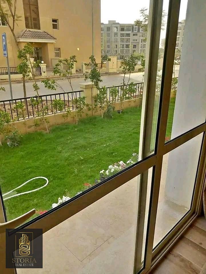 Apartment for sale, 130 m, with a private garden of 207 m, on the Suez Road, in front of Madinaty, in a compound 0