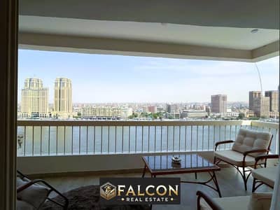 Hotel apartments for sale under Hilton management in Nile Pearl Tower minutes from Zamalek on the Nile in Maadi