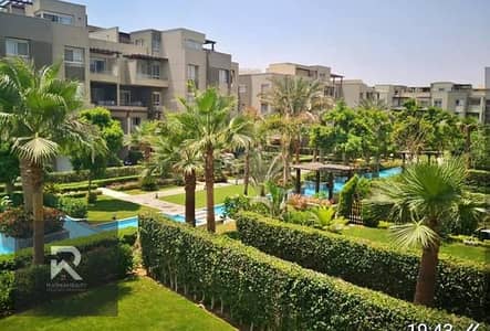 Apartment for sale, finished (ground floor with garden) in the first settlement in front of Al-Rehab in the Swan Lake Residence Hassan Allam Compound