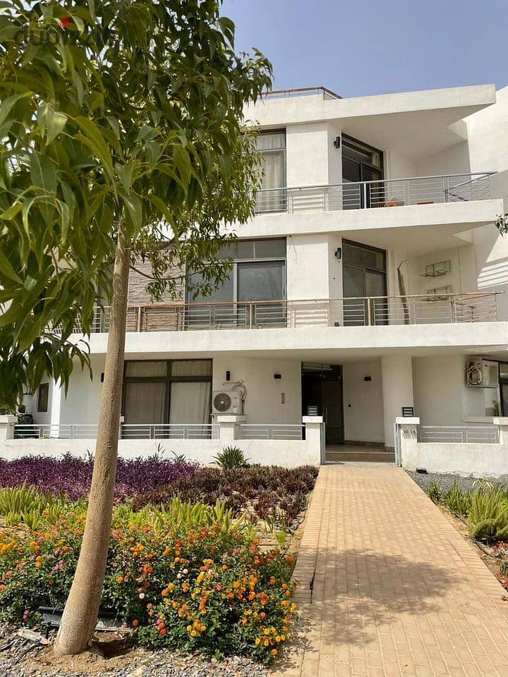 Apartment in a garden for sale directly in front of Cairo Airport with only 5% down payment and the longest installment period in Taj City Compound. 0