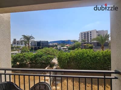 Fully furnished 2BR apartment with a view of the clubhouse for rent in Cairo Festival City Compound, New Cairo, Fifth Settlement.